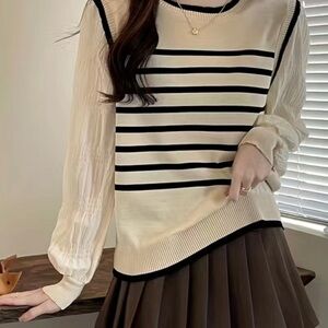 - Stripped knit sweater. New